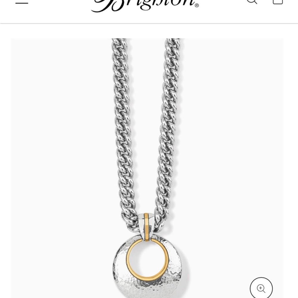 Stunning necklace that is 2-toned with a large pendant never worn bag included